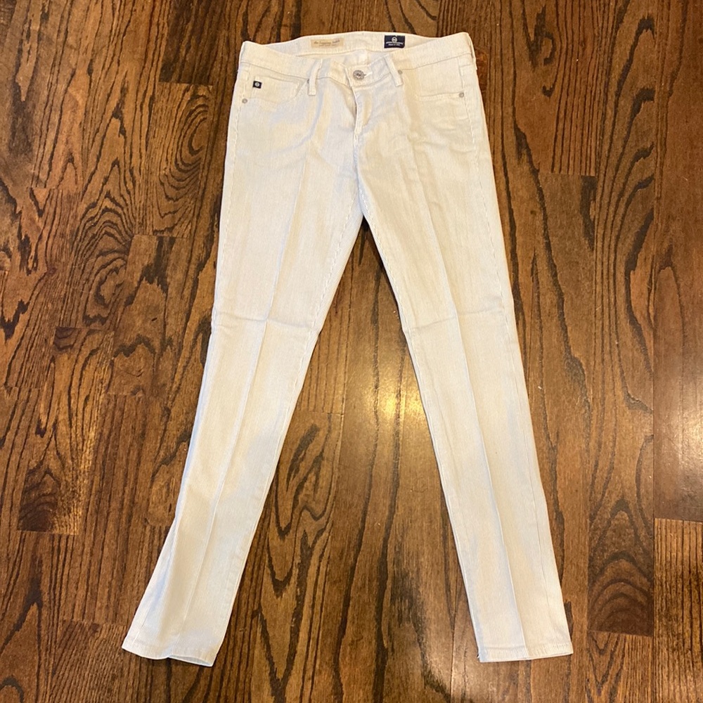 Brand new skinny leggings with gray striping